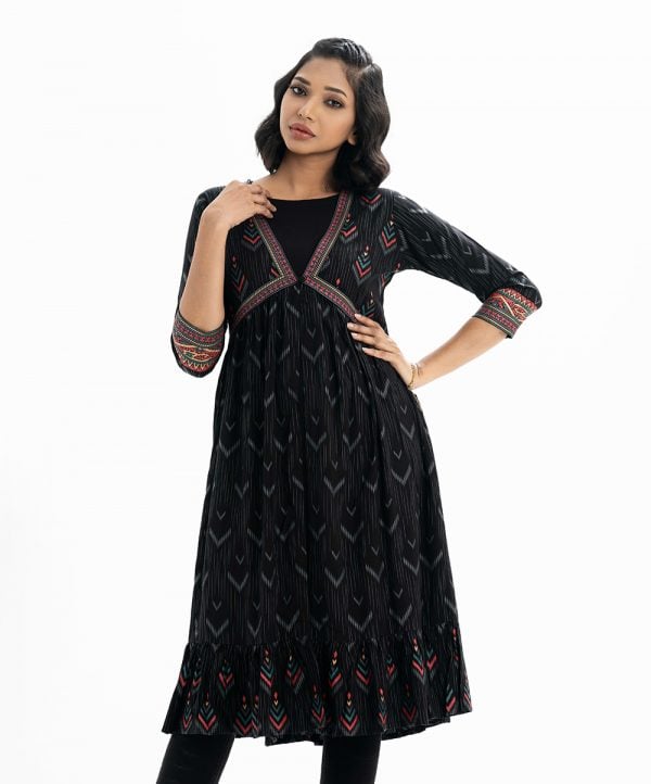Front single button opening three quater sleeved printed viscose shrug with attach tunic. Patchwork at front and sleeves.