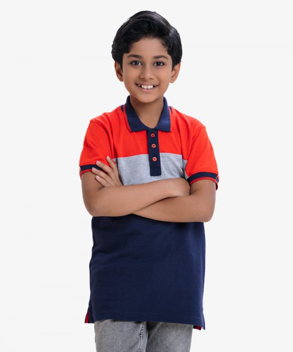 Kid boy's short-sleeved polo shirt in cotton pique fabric. Le Reve logo bird print on the chest.