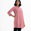 Ikat printed A-line tunic in cotton fabric. Embroidery work at mandarin collar and full sleeves hem. Inseam pockets.