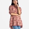 Teen A-line girl shirt in viscose fabric. Classic collar, bishop sleeved. Hight law hem.