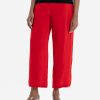 Women's regular palazzo in viscose fabric. Concealed elasticated waistline.