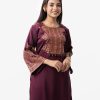 Printed straight kameez in crepe fabric. Round neck and bell sleeves and karchupi at front.