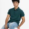 Men's printed polo shirt in cotton pique fabric. Classic collar, short sleeves and a straight-cut hem.