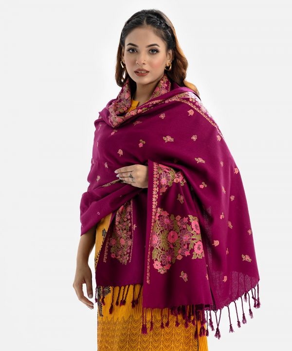Floral printed shawl in cotton viscose blended fabric. Comes with karchupi work and fringe trim at the border.