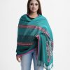 Women's floral printed shawl in viscose fabric. Comes with karchupi at the borders and fringe trim.