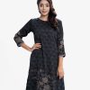 Floral printed straight kameez in crepe fabric. Round neck, three-quarter sleeved. karchupi at the hemline.