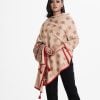 Printed shawl in viscose fabric. Comes with karchupi work detail and attached tassels with crepe border.