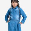 KIds girls jumpsuit in chambray fabric. Classic collar, long-sleeved. front opening zipper and two pockets at the front.