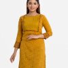 Women's floral printed straight kameez in viscose fabric. Round neck, three-quarter sleeves. Patch at sleeves hem and front with line stitching.