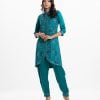 Women's top and bottom set in silk viscose blended fabric. Mandarin collar, three-quarter sleeved. Tulip hemline and karchupi at the front with palazzo pants.