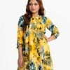 Tent style maternity tunic in printed georgette fabric. Stand collar, bishop sleeves. Dimond pin tuck with karchupi at front.