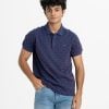 Men's polo shirt in cotton pique fabric. Classic collar, short sleeves and a straight-cut hem.
