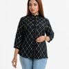 All over printed women's shirt in viscose fabric. Three-quarter sleeves, stand collar with metal buttons front opening.