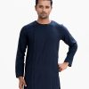 Men's fitted panjabi in cotton fabric. Pin tuck at sleeves and back yoke. Neck side button opening.