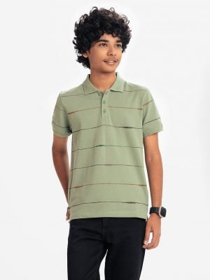 Teen boy's stripe printed polo shirt in stretched cotton knit fabric. Classic collar, short sleeves and a straight-cut hem.