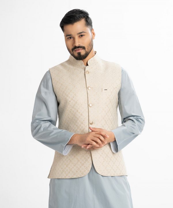 Men's Waistcoat in Jacquard fabric. Mandarin collar, sleeveless, straight hem with button closure and three pockets at front. Embroidery & karchupi assembled.