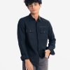 Men's solid color casual shirt in ramie cotton fabric. Classic collar, full sleeves. Two chest pockets with typographic print.