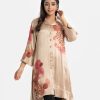 Exclusive straight tunic from Nargisus by Le Reve in silk & viscose blended fabric. Lapel collar, button fastening, karchupi at the front, and full-sleeved.