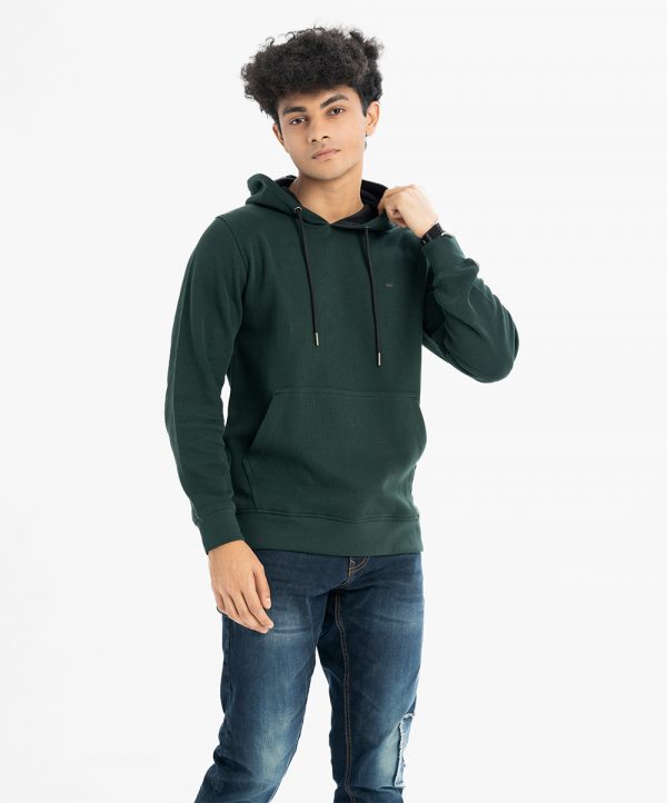 Men's winter hoodie sweat shirt in Interlock fabric. Adjustable drawstring at hood. Full sleeves with kangaroo pockets.