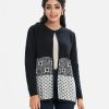 Women's winter single button opening sweater in viscose knit fabric. Round neck, full sleeves.