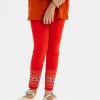 Kid girl's leggings in stretchable cotton knit fabric. Concealed elasticated waistline.