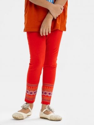 Kid girl's leggings in stretchable cotton knit fabric. Concealed elasticated waistline.