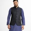 Men's Waistcoat in Jacquard fabric. Mandarin collar, sleeveless, straight hem with button closure and three pockets at front.
