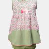 Sleeveless layered newborn baby girls frock in cotton fabric. Floral printed fabric layer attached.