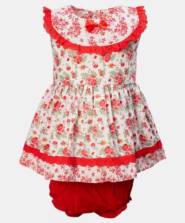 Sleeveless newborn baby girls floral printed frock in cotton fabric with short pant set. Lacework and bow at the front.