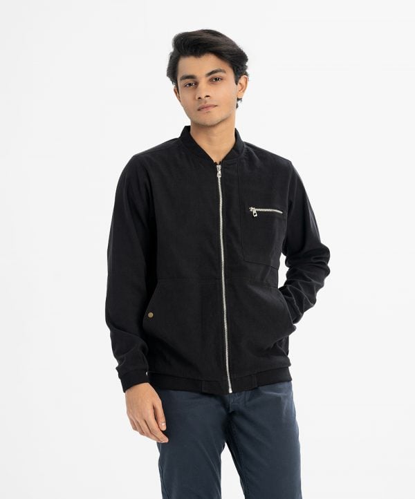 Men's jacket in taffeta fabric. Low Collar and front opening zipper, full-sleeved. Three pockets at the front.