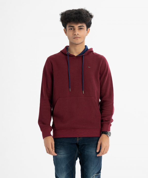 Men's winter hoodie sweat shirt in Interlock fabric. Adjustable drawstring at hood. Full sleeves with kangaroo pockets.
