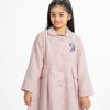Kids A-line jacket in tweed fabric. Long sleeves, Classic collar. Button fastening at the front and two pocket flaps