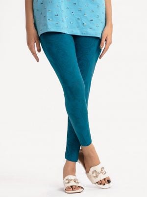 Teen girl's all-over printed leggings in cotton knit fabric. Concealed elasticated waistline.