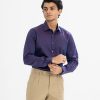 Men's slim fit business formal shirt made in premium cotton fabric. Spread collar, long-sleeved with adjustable buttons at cuffs.