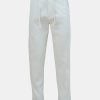 Men's slim-fitted pant pajama in cotton fabric. Two zipper fly side pockets and two back pockets. Concealed elasticated waistline with adjustable drawstring.