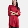 Women's shirt style tunic in crepe fabric. Classic collar and placket, bishop sleeves.