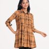Women's A-line check tunic in printed viscose fabric. Classic collar, long-sleeved. Wave pin-tuck and button fastening at the front.