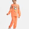 Kid girls' cartoon-printed top and bottom set in soft French terry fabric. Long-sleeved top with sequined detail and pants with twill tape, elastic waist, and adjustable drawstring.