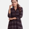 Chevron printed A-line tunic in viscose fabric. Stand Collar, three-quarter sleeves with roll up cuffs.
