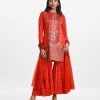 Printed straight salwar kameez in crepe fabric. Round neck, full sleeves and karchupi at front. Chiffon dupatta with sharara pajamas.