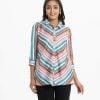 Ladies A-line Shirt in georgette fabric. Classic collar, Long sleeves with roll-up.Button fastening at the front and high low hem.