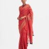 All-over printed saree in blended cotton fabric. Embellished with embroidery, and fringe trim at the border of anchal.