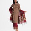 Women's printed Salwar Kameez in zoom fabric. Stand collar, three-quarter sleeves and karchupi at the front of kameez. Half-silk dupatta with crepe palazzo pants.