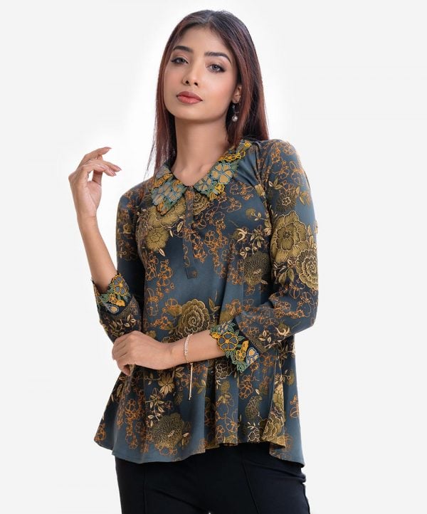 Women's A-line tunic in floral printed georgette fabric. Embroidery cutwork at classic collar and full-sleeved hem.