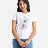 Teen girl's t-shirt in cotton knit fabric. Round neck, short sleeves. Floral print on the chest.