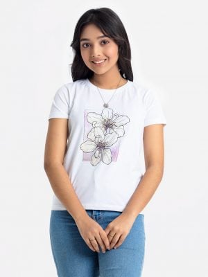 Teen girl's t-shirt in cotton knit fabric. Round neck, short sleeves. Floral print on the chest.