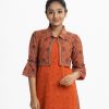 Teen girl printed koti style kameez in viscose fabric. Classic collar koti, bell sleeve with a button fastening at the front and round neck kameez with the patch at the side and hemline.