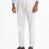 Men's pant pajama in blended cotton fabric. Two zippers fly side pockets with adjustable knots and two back pockets.
