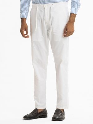 Men's pant pajama in blended cotton fabric. Two zippers fly side pockets with adjustable knots and two back pockets.