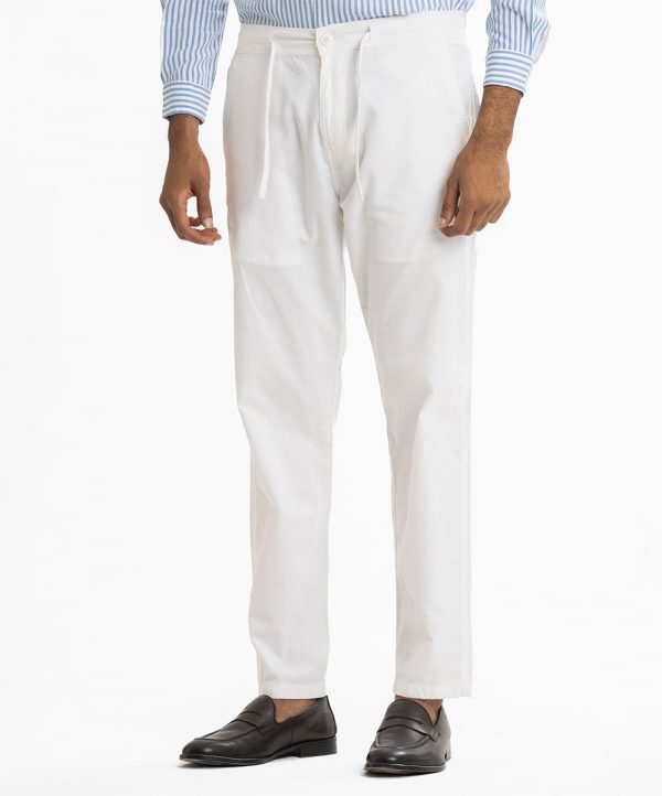 Men's pant pajama in blended cotton fabric. Two zippers fly side pockets with adjustable knots and two back pockets.